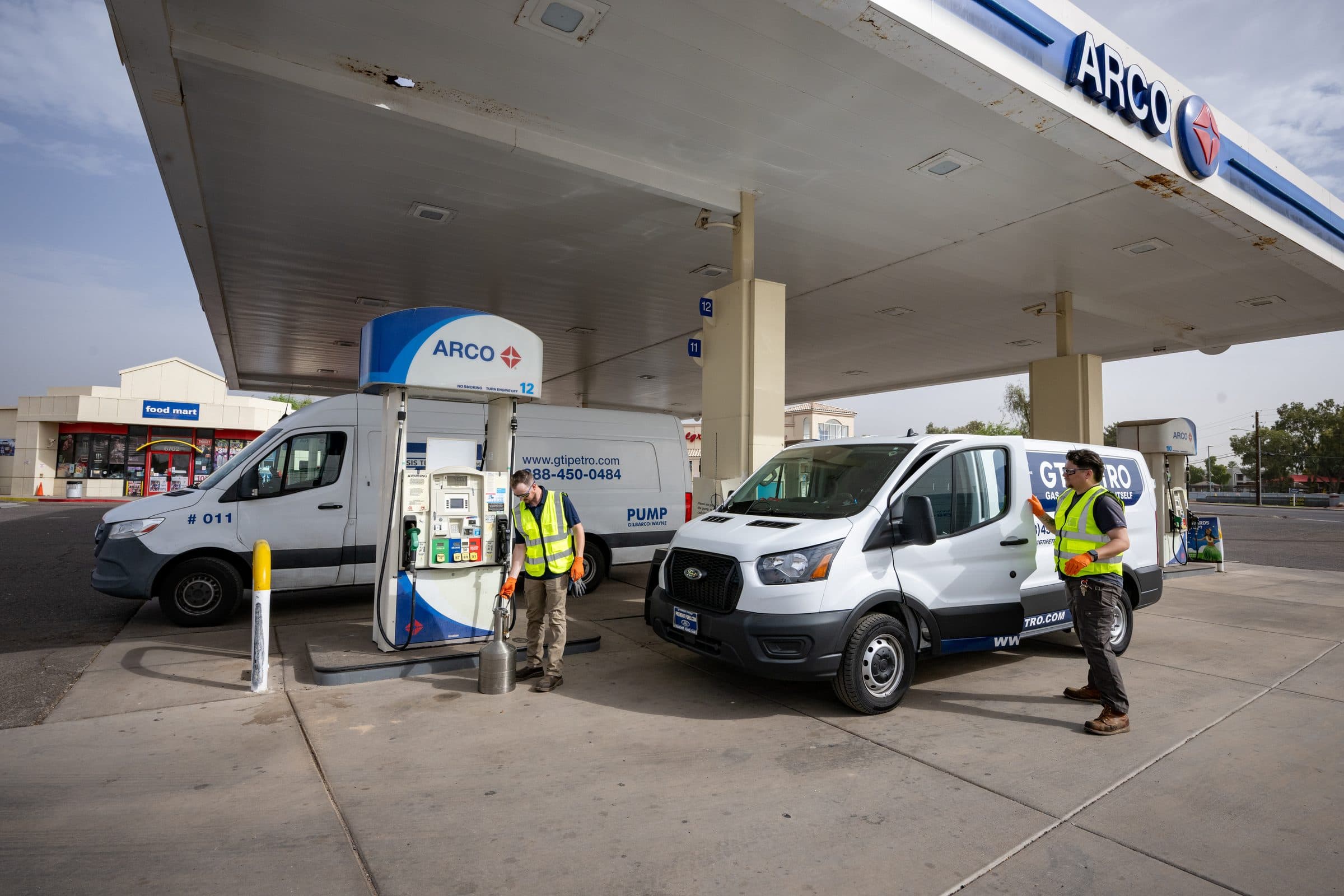 GTI Petro service van and technician at a fueling site