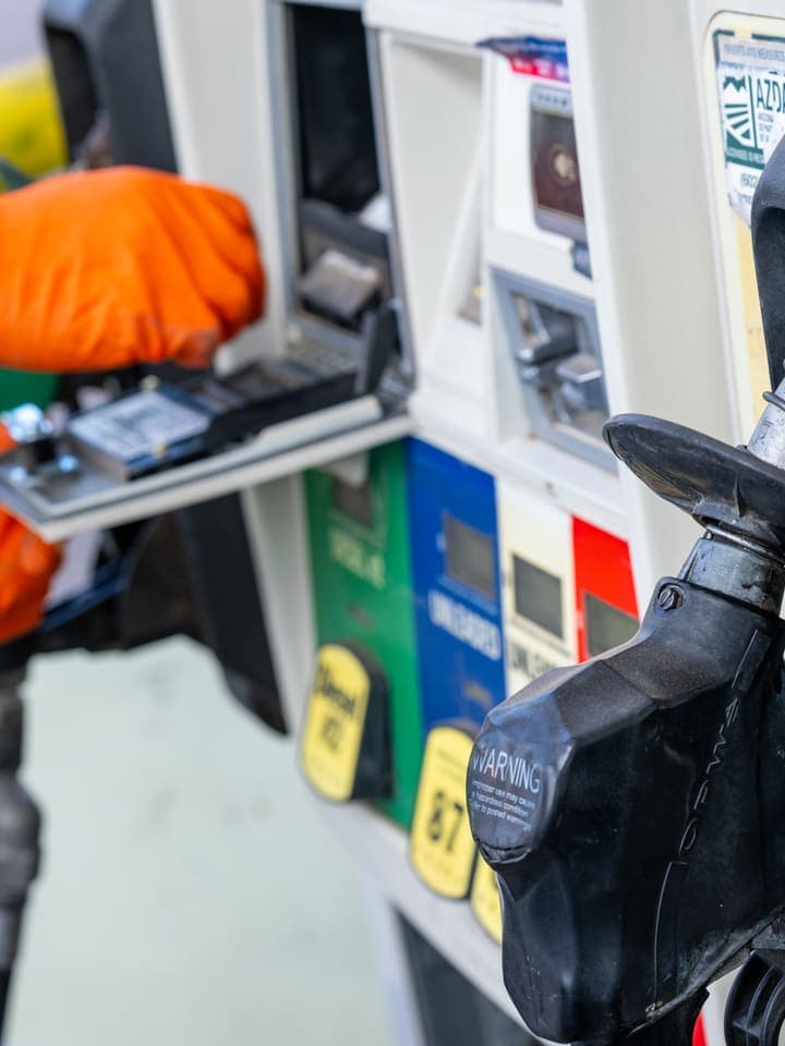 Technician replacing a nozzle
